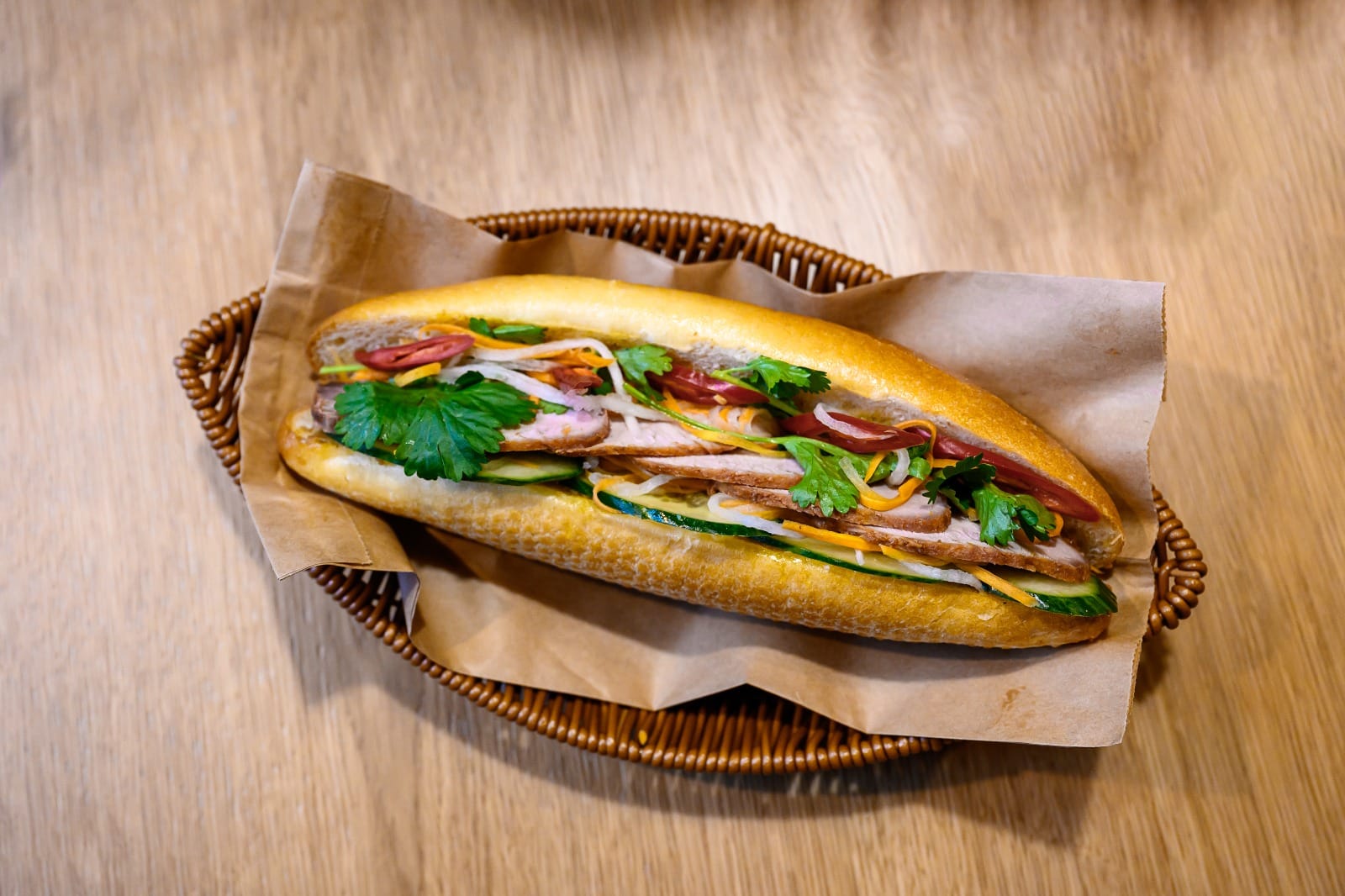 Bánh mì — Vietnamese baguette with grilled pork, pickled carrot, cucumber and a little coriander