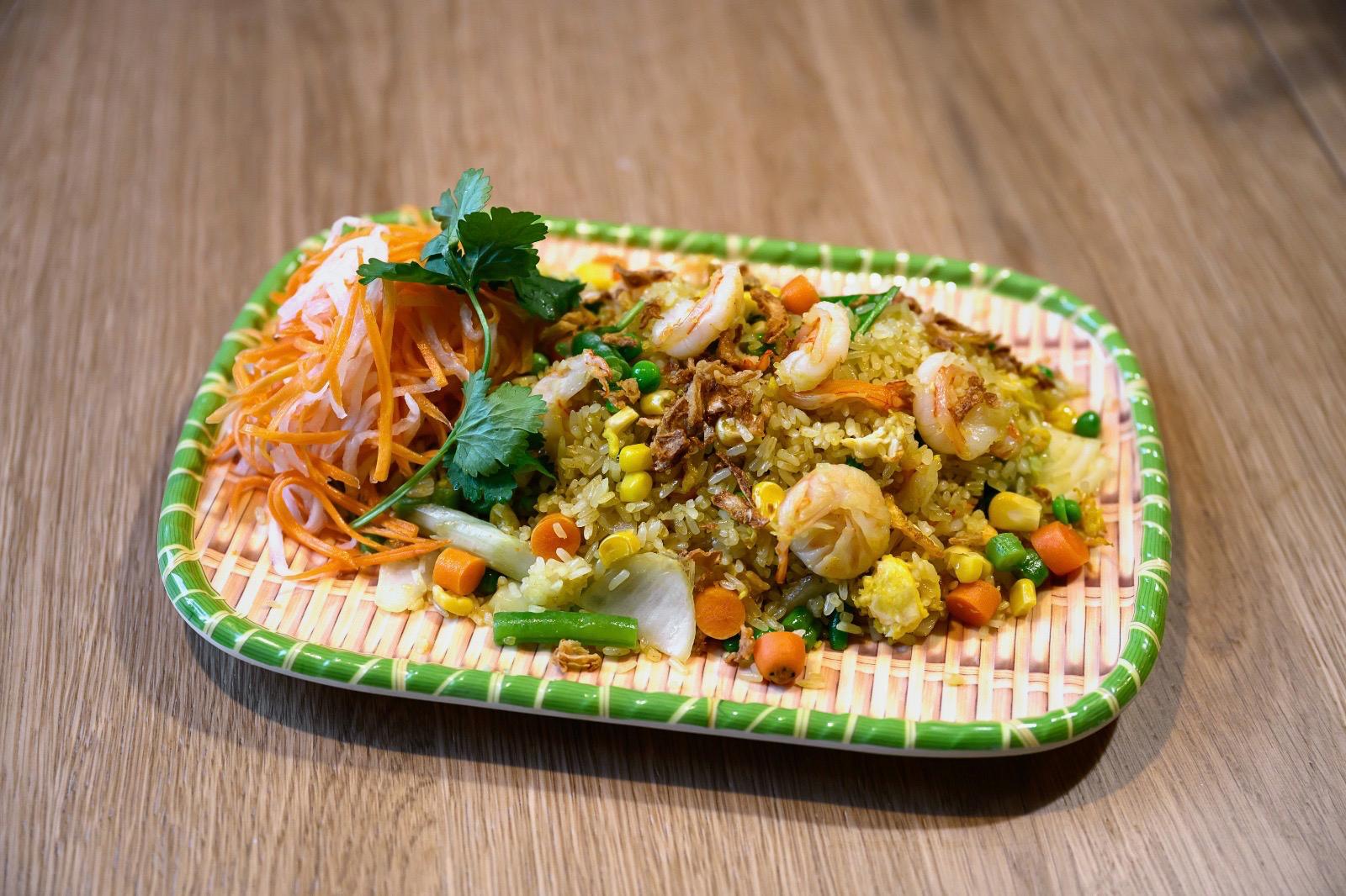 Vietnamese fried rice with egg and vegetables, served without prawns