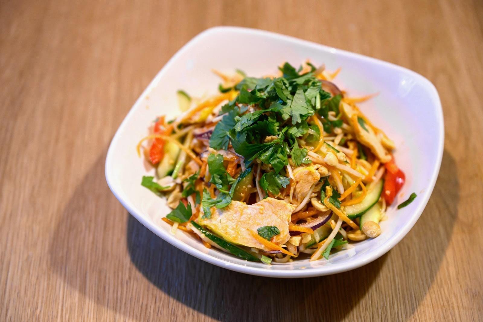 Gỏi gà xé — Vietnamese shredded chicken salad with herbs, peanuts and chili dressing